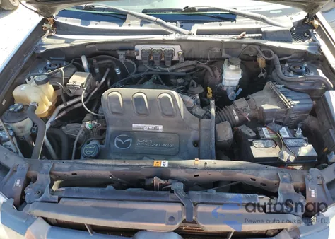 2006 Mazda Tribute S z USA, uszkodzony, nr VIN 4F2YZ94106KM09533